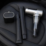 VoltDesk car cleaning kit laid out on a leather car seat
